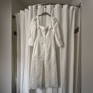 White linen dress with button front